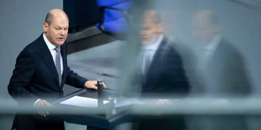 Scholz verteidigt Pläne für teilweisen Soli-Abbau