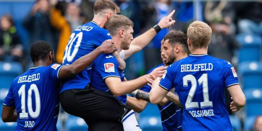 Die Bielefelder besiegten Holstein Kiel mit 2:1. Foto: Guido Kirchner/dpa