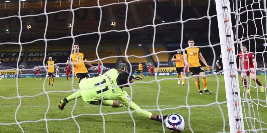WolverhamptonsTorhüter Rui Patricio kann den Treffer von Liverpools Diogo Jota nicht verhindern. Foto: Laurence Griffiths/Pool Getty/AP/dpa