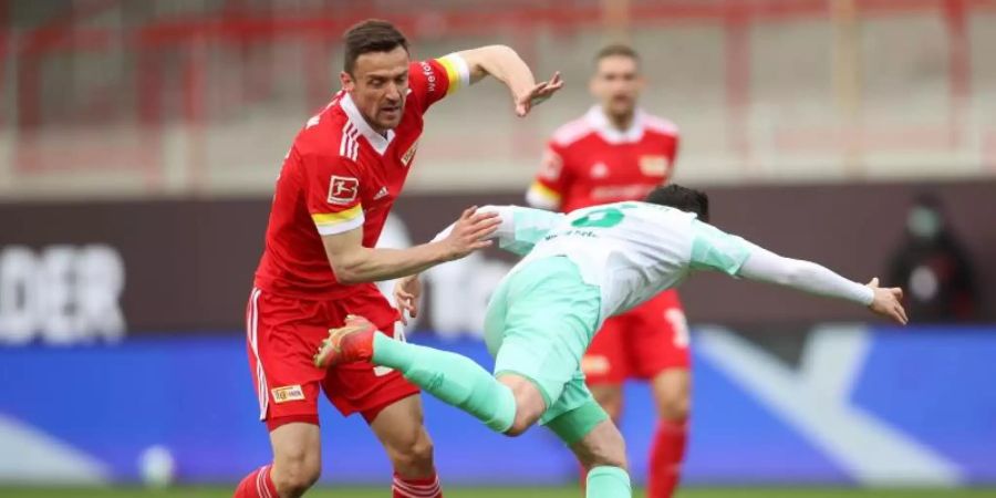 Christian Gentner (l) wird den 1. FC Union Berlin verlassen. Foto: Andreas Gora/dpa-Pool/dpa