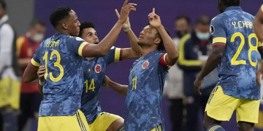 Die Kolumbianer feiern den Sieg im Spiel um Platz 3 gegen Peru bei der Copa América. Foto: Eraldo Peres/AP/dpa