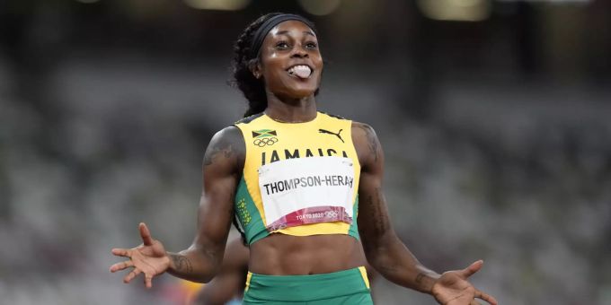 Elaine Thompson-Herah jubelt an den Olympischen Spielen. Elaine Thompson-Herah