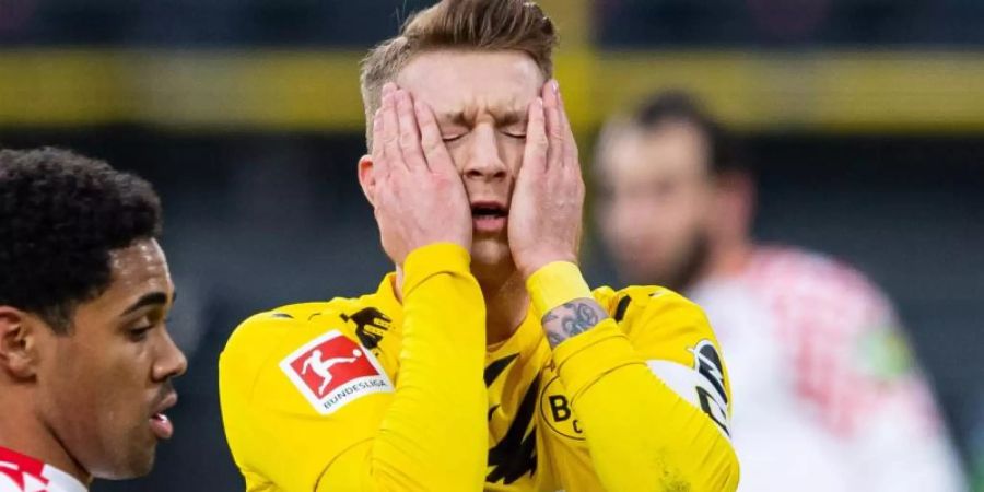 Muss gegen Hoffenheim zuerst auf der Bank Platz nehmen: BVB-Kapitän Marco Reus. Foto: Guido Kirchner/dpa-Pool/dpa