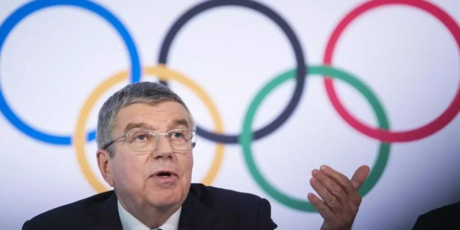 Thomas Bach ist der Präsident des Internationalen Olympischen Komitees (IOC). Foto: Jean-Christophe Bott/KEYSTONE/dpa