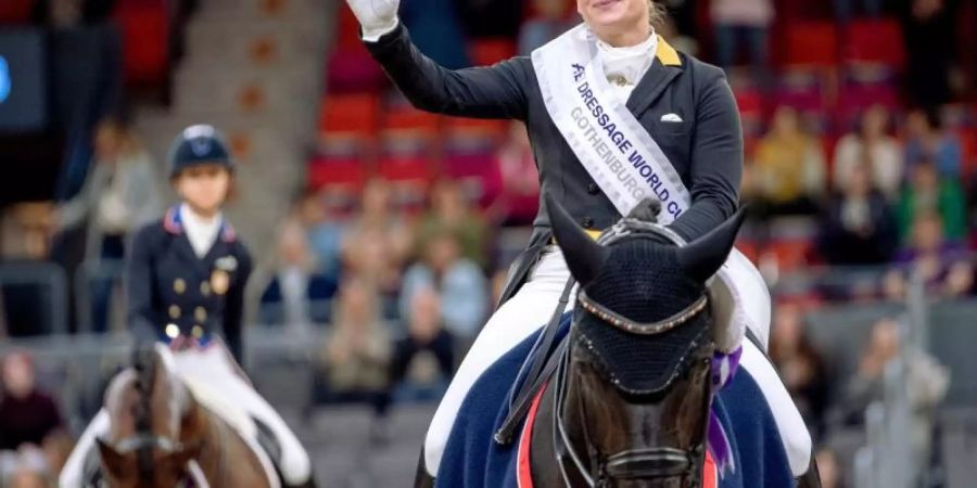 Isabell Werth feiert auf Weihegold ihren Weltcup-Hattrick. Foto: Bjorn Larsson Rosvall/Tt/TT NEWS AGENCY/AP/dpa