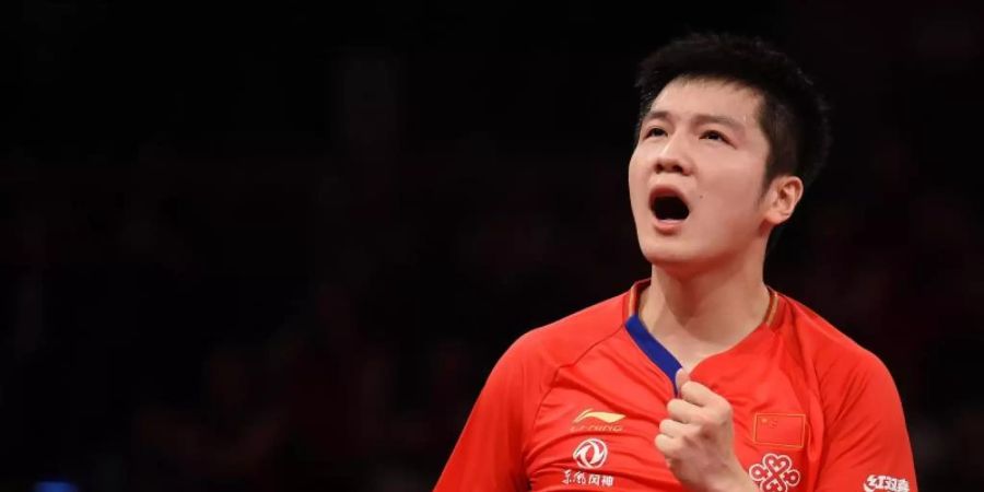 Hat die German Open gewonnen: Der Chinese Fan Zhendong jubelt. Foto: Carmen Jaspersen/dpa