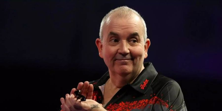 Hat seinen Rücktritt vom aktiven Darts nicht bereut: Rekord-Weltmeister Phil Taylor. Foto: Steven Paston/PA Wire/dpa