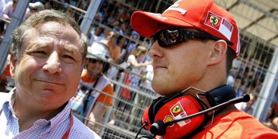 Verbindet eine enge Freundschaft: Jean Todt und Michael Schumacher. Foto: Felix Heyder/epa/dpa