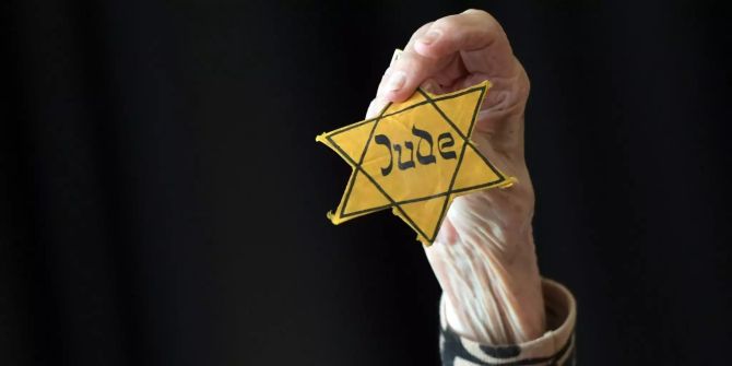 Holocaust-Überlebende mi Judenstern