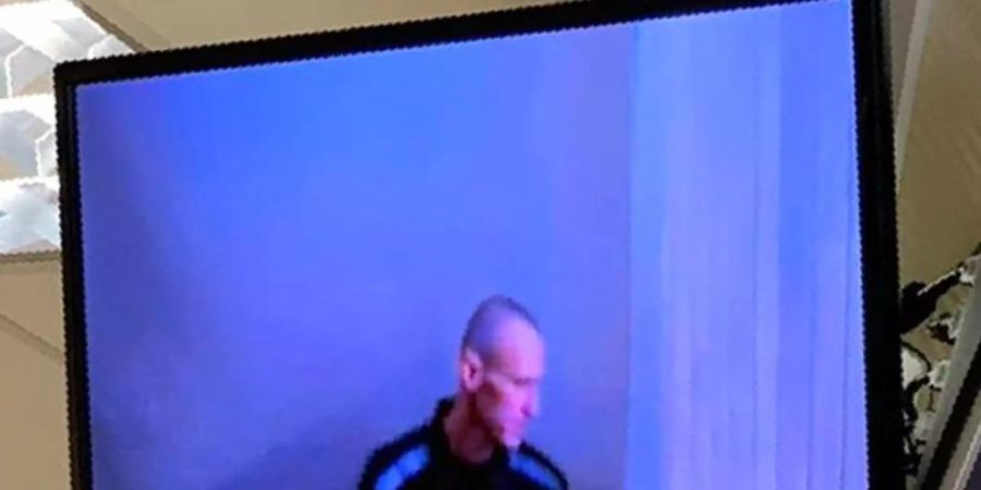 Das von einem Moskauer Bezirksgericht zur Verfügung gestellte Foto zeigt den russischen Oppositionsführer Alexej Nawalny per Videoschalte aus dem Gefängnis. Foto: Uncredited/Babuskinsky District Court/AP/dpa