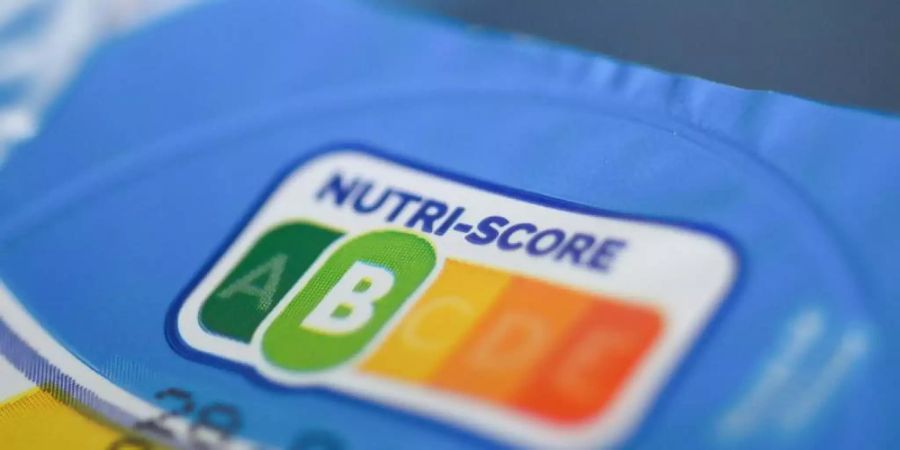In einer Umfrage zur Kennzeichnung von Zucker, Fett und Salz in Lebensmitteln hat das farbige Logo Nutri-Score schwache Zustimmungswerte erhalten. Foto: Christophe Gateau