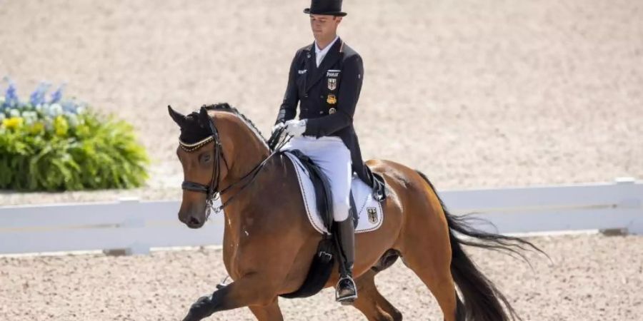 Dressurreiter Sönke Rothenberger auf seinem Pferd Cosmo. Foto: Stefan Lafrentz