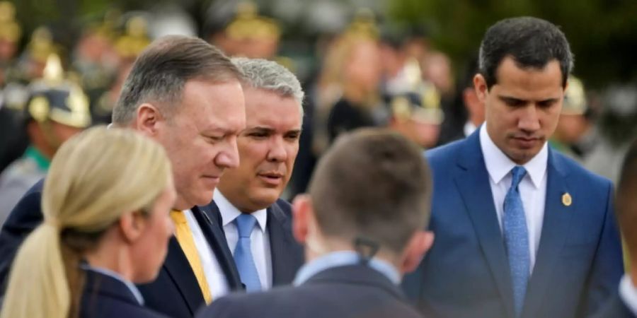 Mike Pompeo (l.), Iván Duque (M.) und Juan Guaidó
