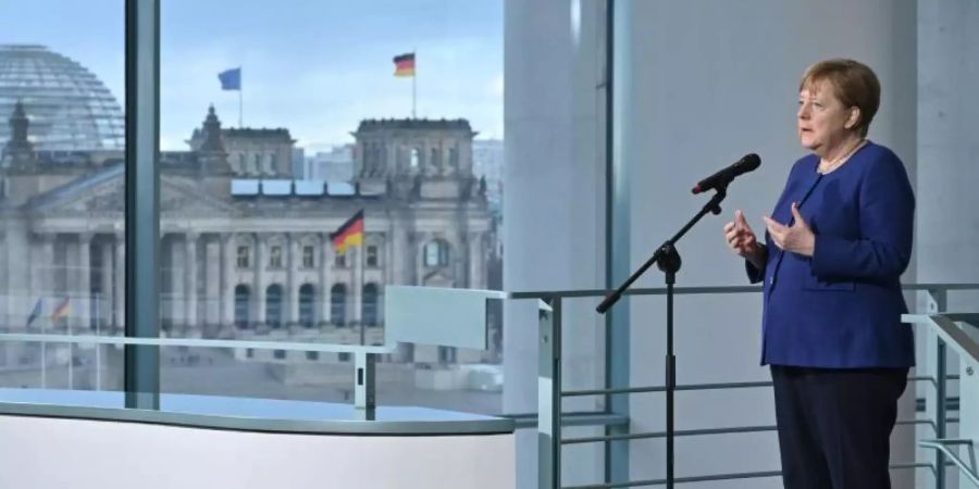 Kanzlerin Merkel über die Coronavirus-Krise: «Eine Herausforderung, wie wir sie seit langem nicht gekannt haben». Foto: John Macdougall/POOl AFP/dpa