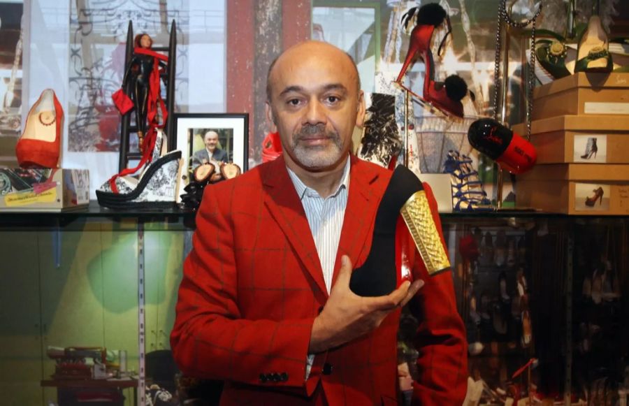 Der Designer Christian Louboutin ist für seine Schuhe mit den roten Sohlen bekannt.