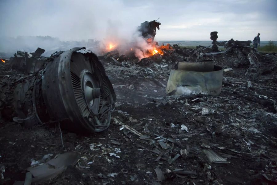 Die Überresten des verheerenden Flugzeugabsturzes.