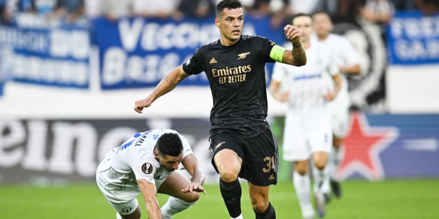 Die Zürcher um Blerim Dzemaili (l.) unterliegen im Duell mit Arsenal und Granit Xhaka (r.).