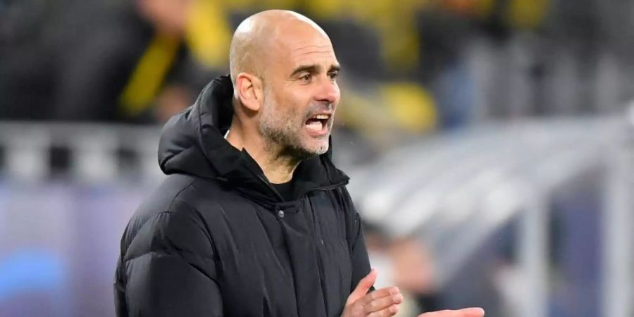 Als Trainer von Manchester City steht Guardiola im Halbfinale gegen Paris Saint-Germain. Foto: Martin Meissner/AP-Pool/dpa