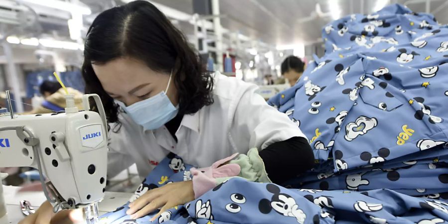 Lokale Coronavirus-Ausbrüche verlangsamen das Wachstum der chinesischen Volkswirtschaft. (Symbolbild)