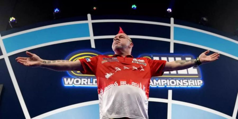 Will bei der Darts-WM ins Halbfinale: Peter Wright. Foto: John Walton/PA Wire/dpa