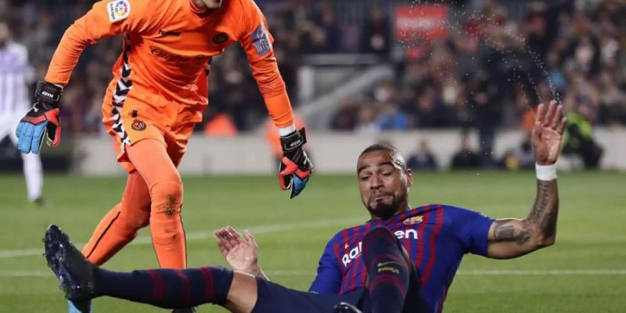 Wurde während der Spiels gegen Valladolid von Einbrechern heimgesucht: Barca-Profi Kevin-Prinz Boateng (r). Foto: Manu Fernandez/AP