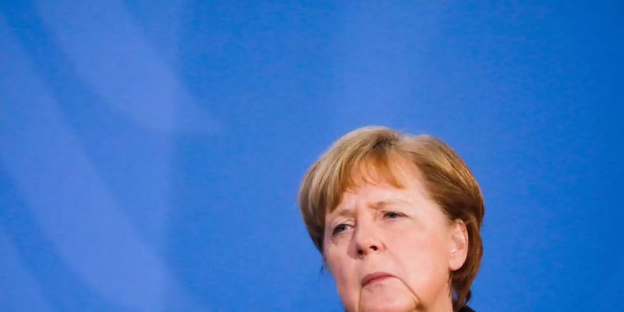 Laut «Bild»-Zeitung denkt auch Kanzlerin Merkel über eine Änderung des Infektionsschutzgesetzes nach. Foto: Markus Schreiber/AP POOL/dpa