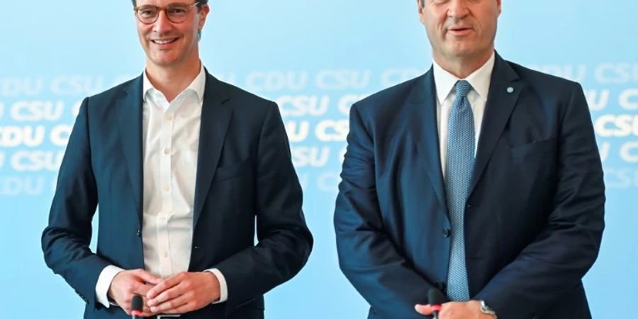 Hendrik Wüst (links) und Markus Söder