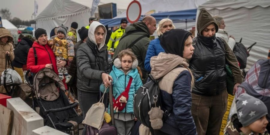 Geflüchtete an der ukrainisch-polnischen Grenze