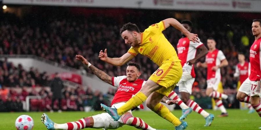 Diogo Jota (r) trifft für den FC Liverpool beim FC Arsenal. Foto: John Walton/PA Wire/dpa