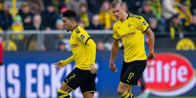 Dortmunds Jadon Sancho (L) und Erling Haaland treffen im Champions-League-Achtelfinale auf Paris Saint Germain. Foto: Guido Kirchner/dpa Dortmunds Jadon Sancho (L) und Erling Haaland treffen im Champions-League-Achtelfinale auf Paris Saint Germain. Foto: Guido Kirchner/dpa
