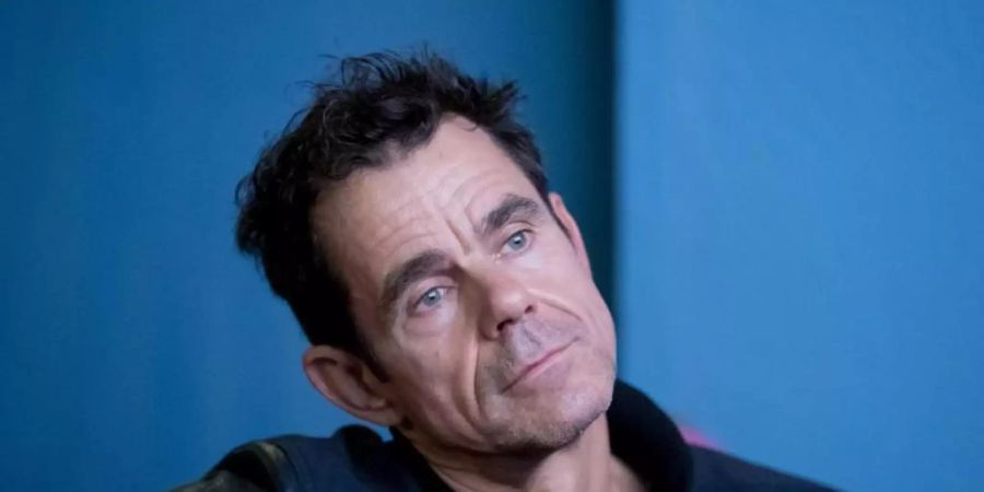 Der Tom Tykwer spricht von einer «harten Zeit» für die Kinobetreiber. Foto: Christoph Soeder/dpa