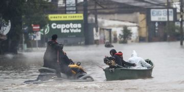 Brazilian police patrol flood zones to deter theft