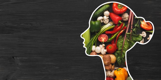 Von Omega-3 bis Antioxidantien: So ernähren Sie Ihr Gehirn richtig. Frauenkopf, Gemüse, Illustration