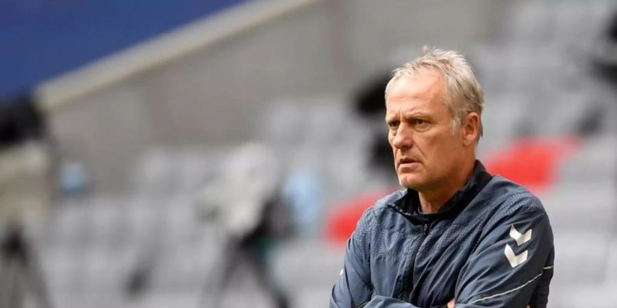 Muss zum Saisonabschluss mit Freiburg gegen Schalke ran: SC-Coach Christian Streich. Foto: Sven Hoppe/dpa-Pool/dpa