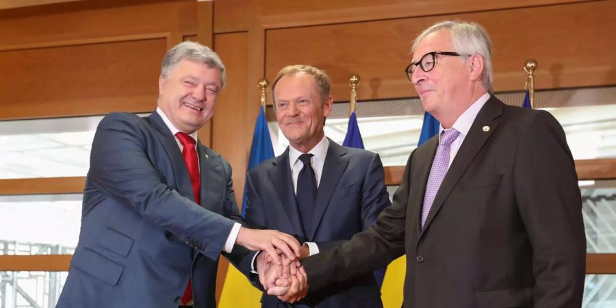 Petro Poroshenko, Donald Tusk und Jean-Claude Juncker beim Treffen in Brüssel.