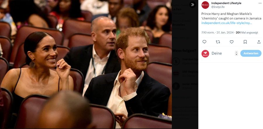 Meghan Markle und Prinz Harry lächeln das Sitzplatz-Debakel weg.