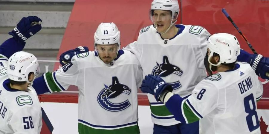 Bei den Vancouver Canucks haben sich 25 Spieler und Betreuer mit dem Coronavirus infiziert. Foto: Adrian Wyld/The Canadian Press/AP/dpa