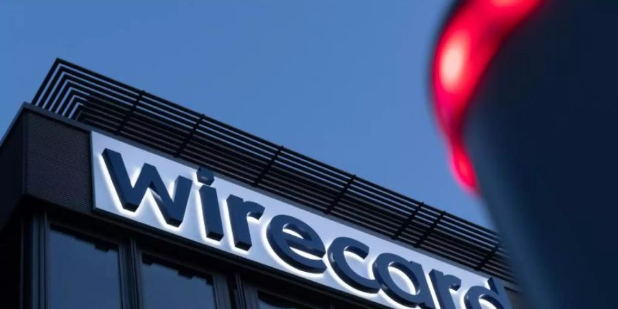 Das Wirecard-Logo ist am Hauptsitz des Zahlungsdienstleisters in Aschheim bei München zu sehen. Foto: Peter Kneffel/dpa