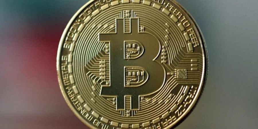 Der Bitcoin ist vor allem als Investitions- beziehungsweise Spekulationsobjekt gefragt. Foto: Ina Fassbender/dpa