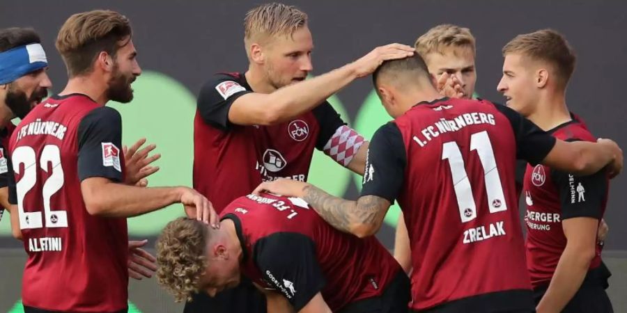 Mit dem 2:0-Sieg im Hinspiel haben die Nürnberger beste Aussichten sich gegen den FC Ingolstadt in der Relegation zu behaupten. Foto: Daniel Karmann/dpa