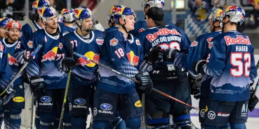 München feierte einen Sieg bei den Eisbären Berlin. Foto: Matthias Balk/dpa
