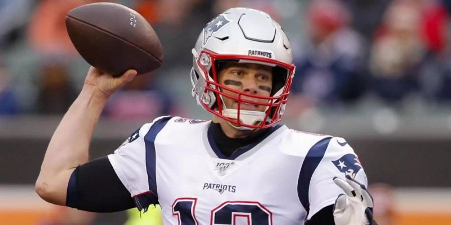 Quarterback-Legende Tom Brady und New England haben das letzte Spiel vor den Playoffs verloren. Foto: Gary Landers/AP/dpa