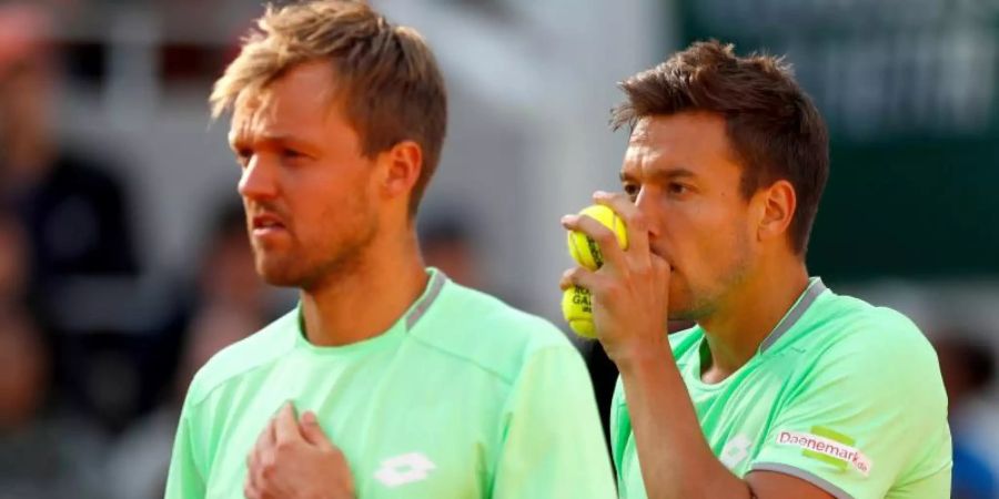 Haben sich für das Saisonabschluss-Turnier der besten acht Teams des Jahres qualifiziert: Kevin Krawietz (l) und Andreas Mies. Foto: Pavel Golovkin/AP/dpa