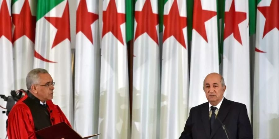 Algeriens neuer Präsident Tebboune (r.) bei seiner Vereidigung