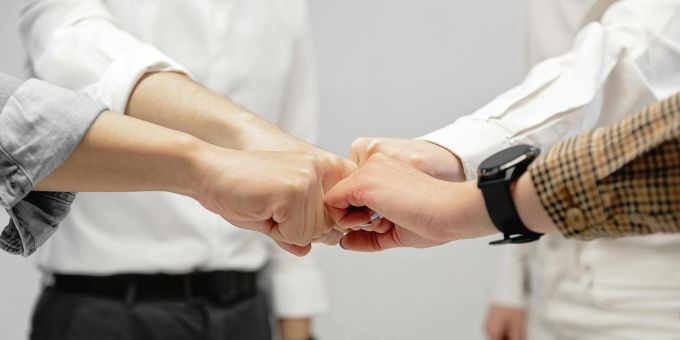 Mit Optimismus bist du im Beruf leichter erfolgreich. Kollegen, Team