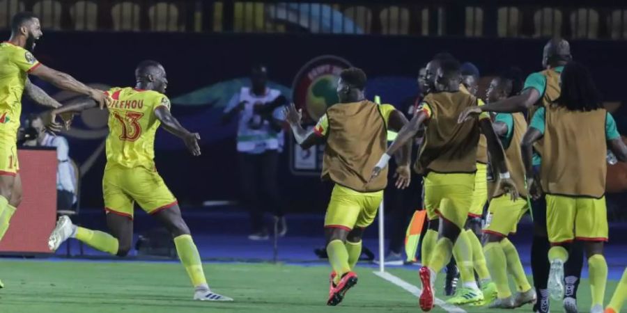 Benins Spieler feiern den Einzug ins Viertelfinale des Afrika-Cups. Foto: Oliver Weiken