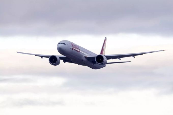 Mit dem Flieger in die Ferien - eine für die Umwelt belastende Selbstverständlichkeit Eine Swiss Boeing 777