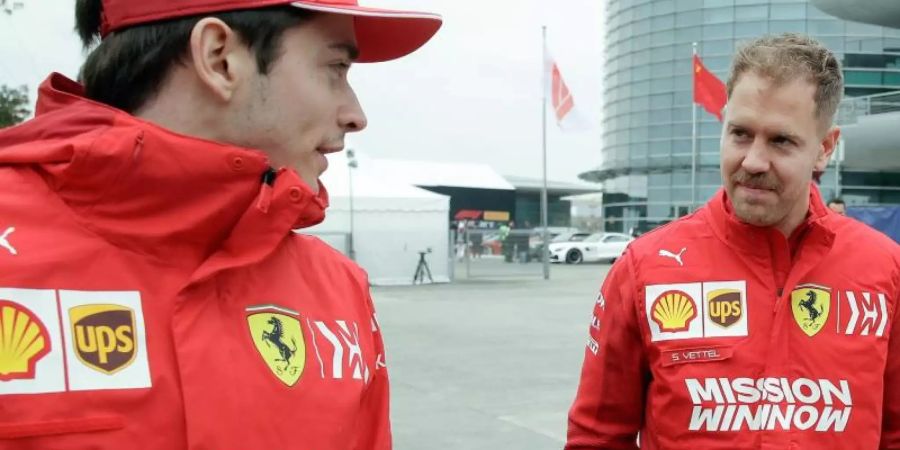 Teamkollegen und Konkurrenten zugleich: Sebastian Vettel (r) und Charles Leclerc. Foto: Andy Wong/AP