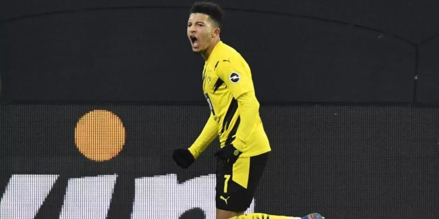 Dortmunds Jadon Sancho bejubelt sein Tor zum 2:0. Foto: Martin Meissner/Pool AP/dpa