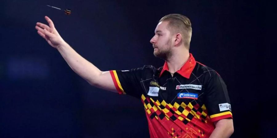 Dimitri Van den Bergh hat das Achtelfinale der Darts-WM erreicht. Foto: John Walton/PA Wire/dpa